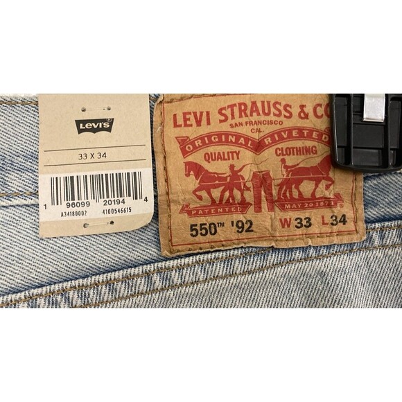 Levi’s 550 '92 Relaxed Taper Jeans 33x34 Light Wash Blue NWT Paint Splatter - Picture 8 of 8
